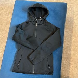 Black hooded Salomon jacket sweatshirt with subtle floral embroidery on back.